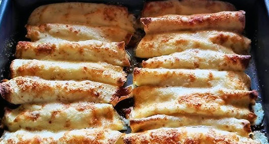 Oven-baked stuffed crepes: an inviting and satisfying appetizer.